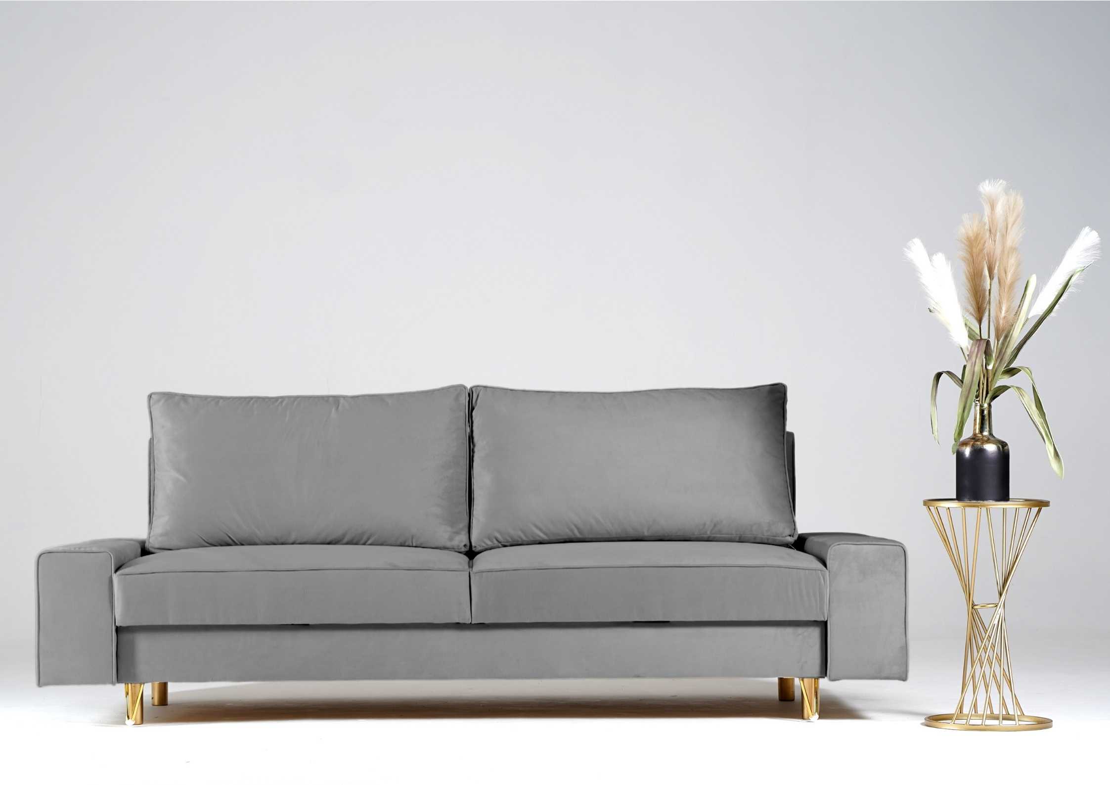 Szara sofa na złotych nogach